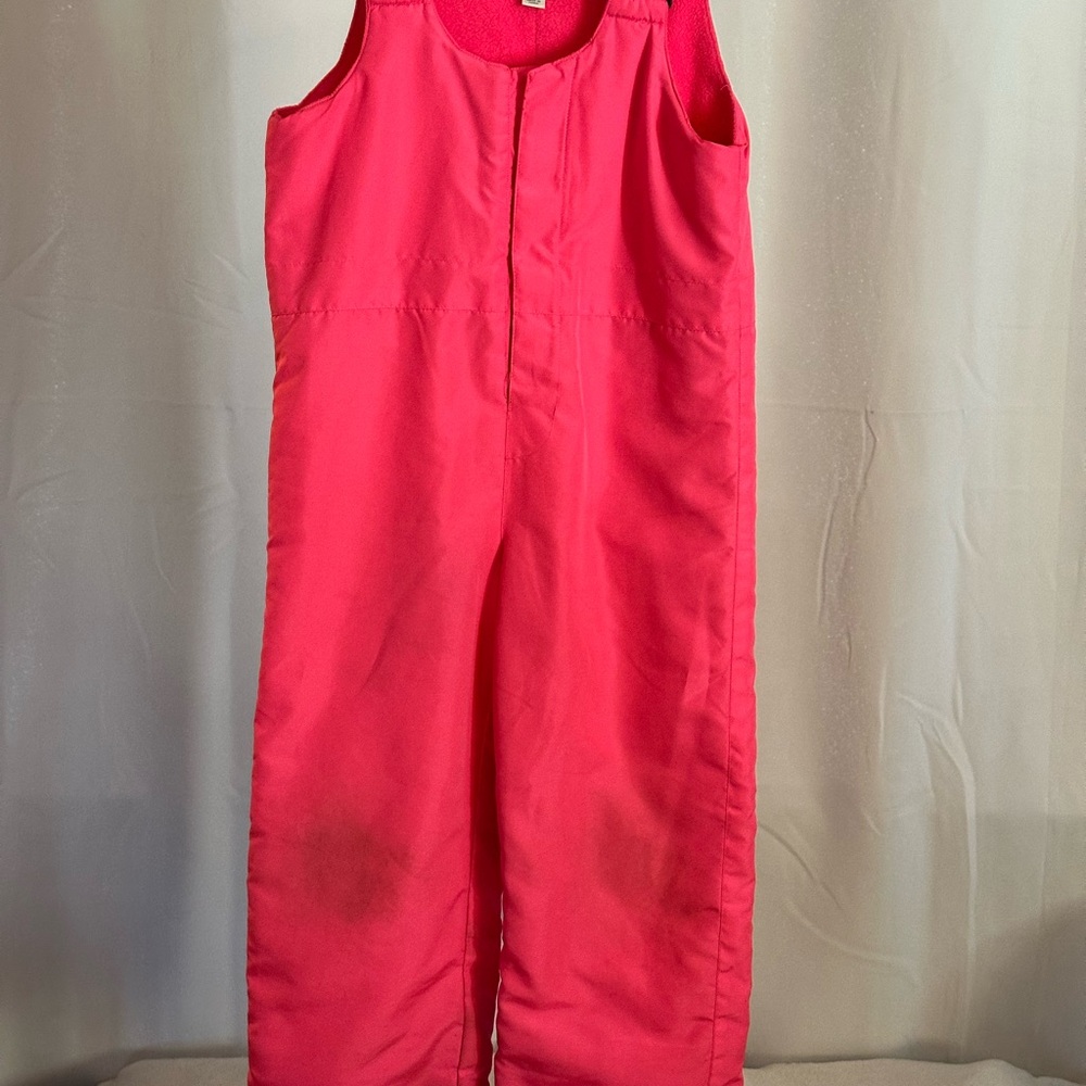 Bright pink snow suit
